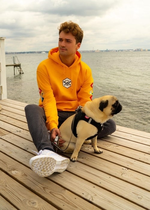 MrCrainer as seen in a picture that was taken with his dog Bobby in August 2019