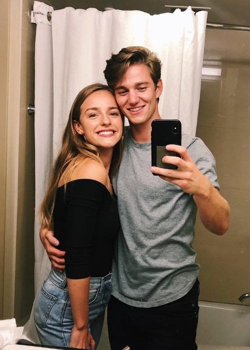 Nico Greetham as seen while taking a mirror selfie with Jacqueline Scislowski at the Official Power Morphicon Convention