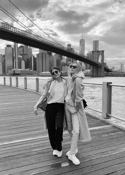 Phoebe Dynevor (Right) posing for a picture in New York City, New York