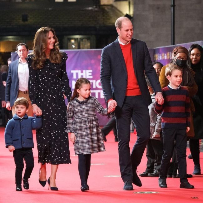 Prince Louis of Cambridge (left) as seen together with his family in December 2020