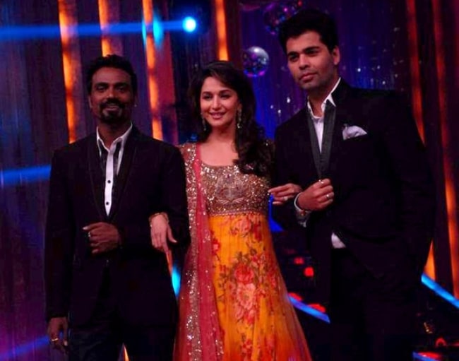 Remo D'Souza (Left) as seen on the launch of 'Jhalak Dikhhla Jaa 5' along with his co-judges Madhuri Dixit and Karan Johar in September 2012