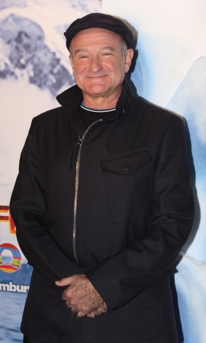 Robin Williams posing for the camera at the 'Happy Feet Two' Australian premiere at the Entertainment Quarter in Sydney, Australia in December 2011