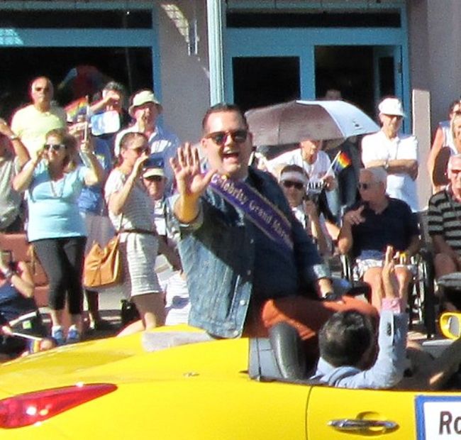Ross Mathews as seen waving at the Palm Springs Pride Parade in 2013