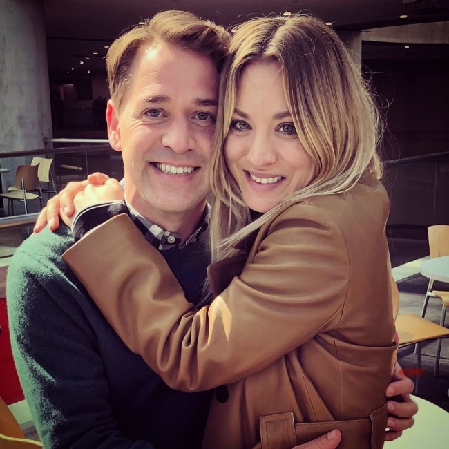 T. R. Knight smiling for a picture along with Kaley Cuoco in November 2020