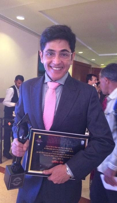 Aasif Sheikh smiling for a picture in March 2018