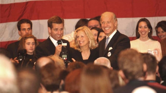 Beau Biden pictured while giving his victory speech as Delaware's newly-elected Attorney General on November 7, 2006, as Jill Biden, Joe Biden, and the Biden family look on