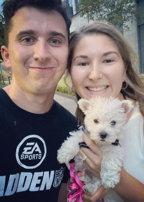 Brett Barrett as seen in a picture that was taken with his wife Maddy and their dog Heidi in September 2020