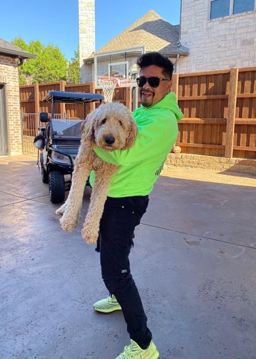 H3CZ as seen in a picture that was taken in October 2019, with one of his dogs