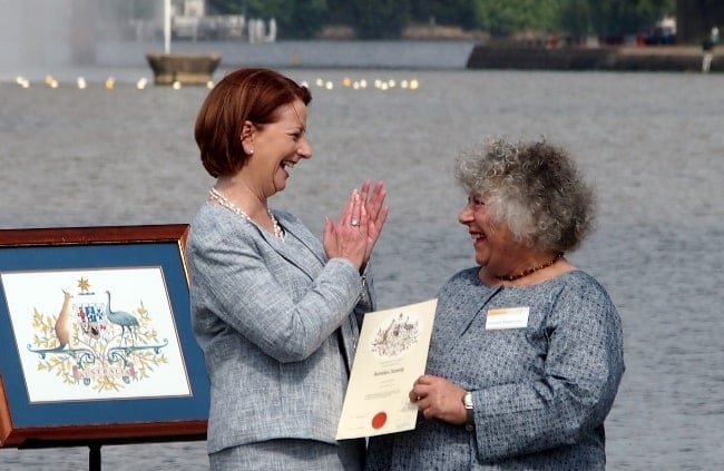 Miriam Margolyes (Right) shortly after being presented with her Australian citizenship certificate by Prime Minister Julia Gillard during the 2013 National Flag Raising and Citizenship ceremony