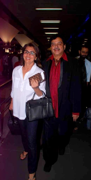 Neetu Singh and Shatrughan Sinha returning from IIFA 2012