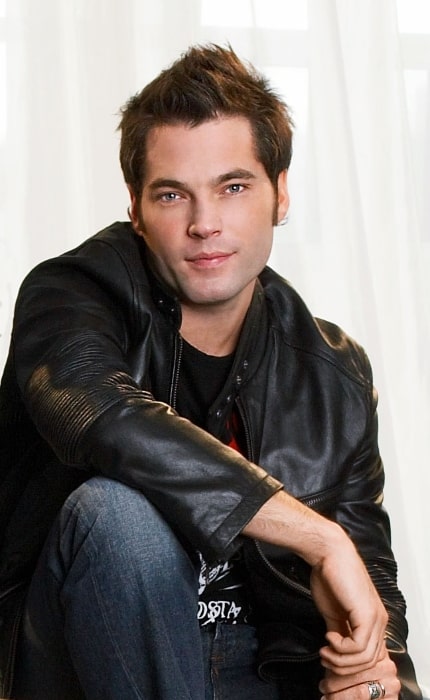 Tim Rozon posing for the camera