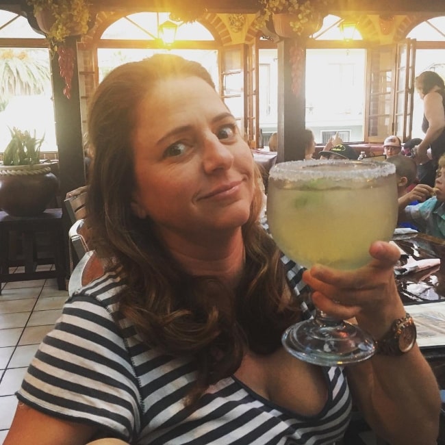 Annie Mumolo as seen while posing for a picture with her drink in July 2016