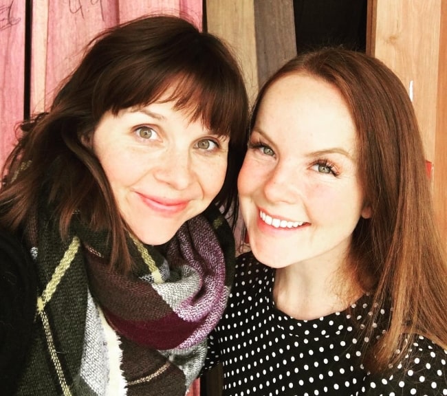 Aviva Baumann (Right) smiling for a picture alongside Audrey Moore in August 2016