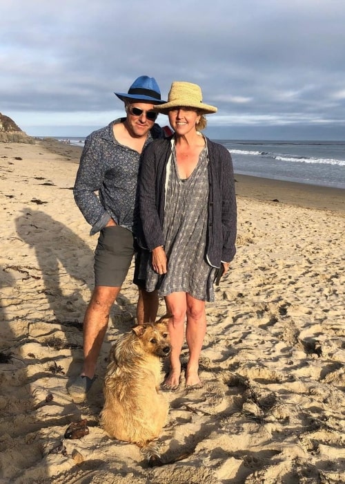 Brooke Smith and her husband Steve Lubensky as seen in a picture with their dog on the beach in June 2020