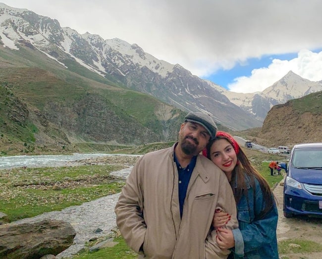 Dananeer Mobeen smiling in a picture alongside her father