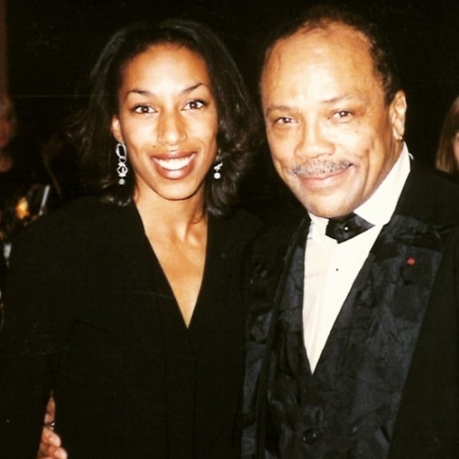 Kim Hill as seen in a picture with legendary singer, songwriter, and record producer Quincy Jones in possibly 1994