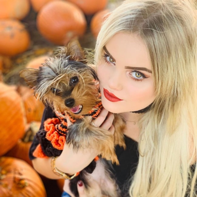Mia Diaz as seen in a picture that was taken with her Yorkshire Terrier name Lolo in October 2019, in Central Presbyterian Church