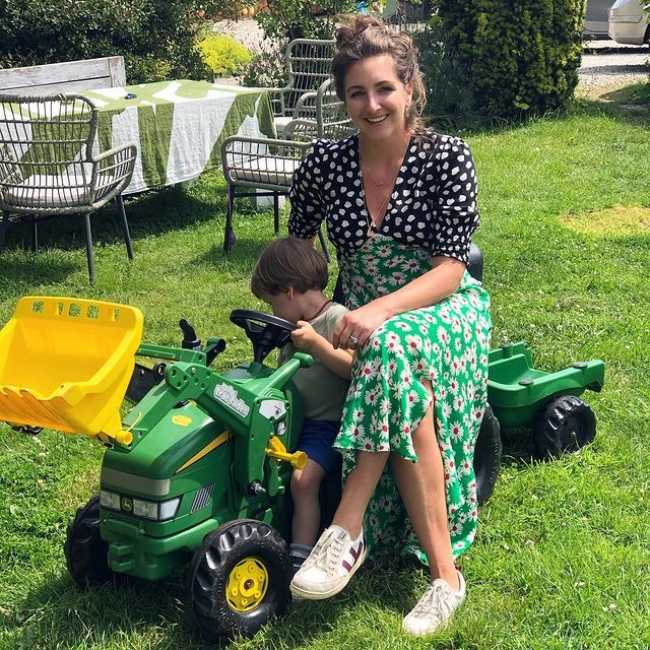 Natasha as seen smiling with her son Rudy in 2019