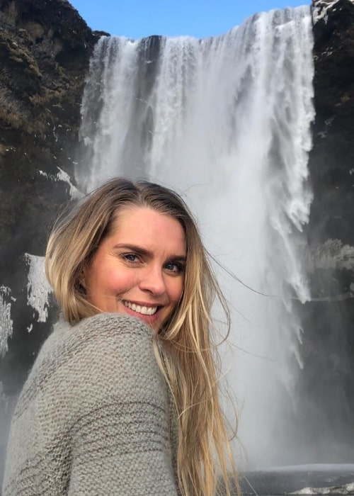 Ragga Ragnars as seen while smiling for the camera at Skógafoss waterfall in Skógar, Iceland in February 2021