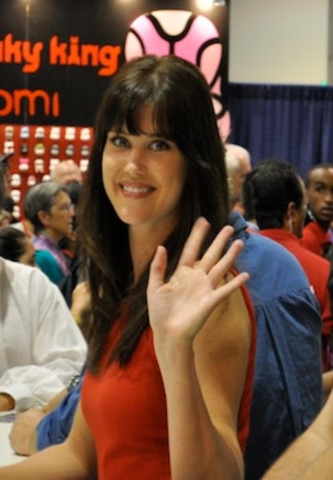 Sarah Lancaster as seen while smiling for the camera at Comic Con 2010