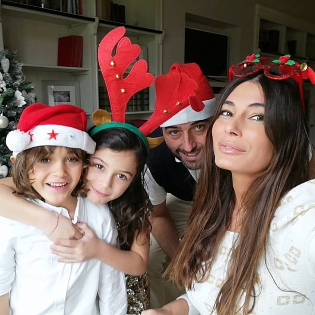 Barbara Chiappini as seen in a selfie with her husband Carlo Marini Agostini and children Sveva Lucia and Folco in December 2020