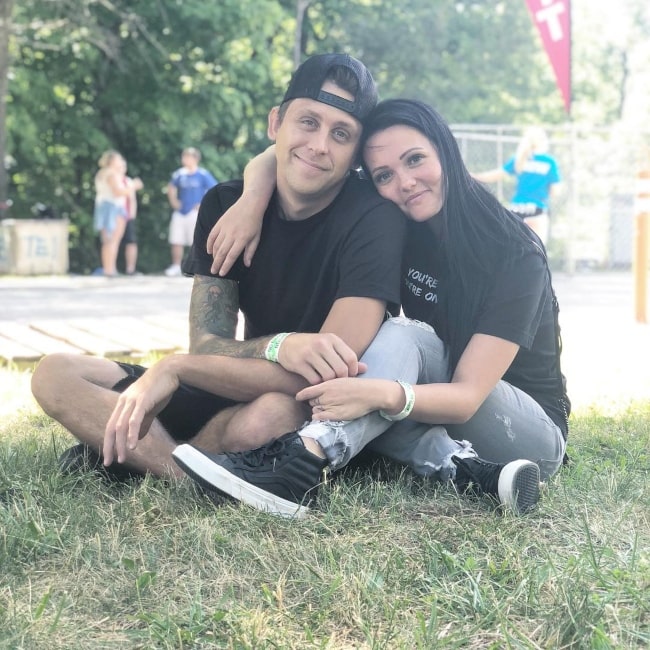 Brittney Smith as seen in a picture with her beau Roman Atwood at the Vans Warped Tour in July 2018
