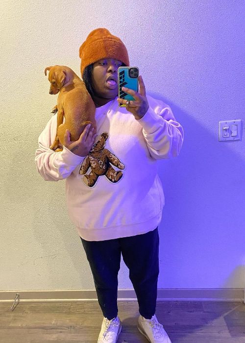 Chika as seen taking a selfie with her dog in 2020