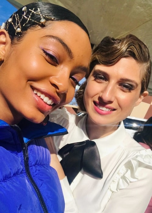 Emily Arlook (Right) smiling in a selfie alongside Yara Shahidi in an Instagram post in February 2021