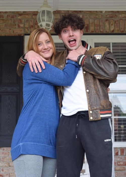 Garrett Overboe as seen while posing for the camera with his mother in an Instagram post in May 2020