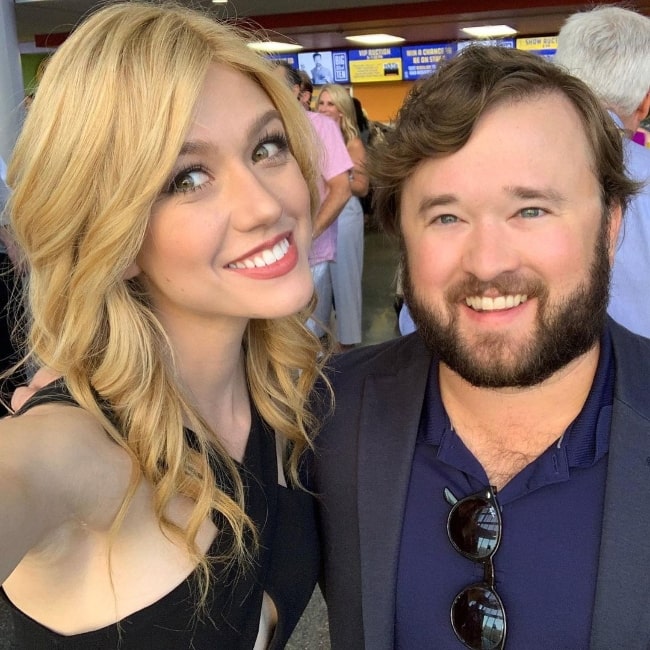 Haley Joel Osment smiling in a selfie alongside Katherine McNamara in Kansas City, Missouri in June 2019