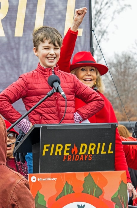 Iain Armitage pictured while speaking at Fire Drill Fridays climate change protest at the US Capitol, with Jane Fonda, in 2020