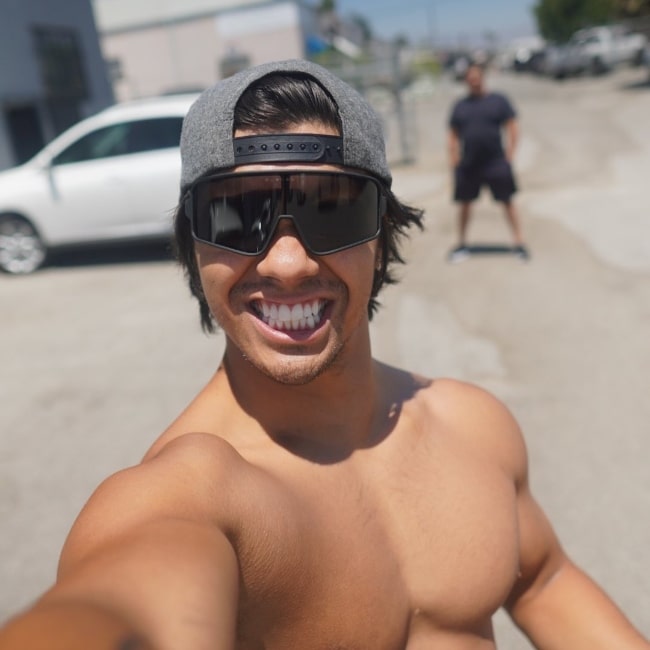 Jordan Buhat clicking a shirtless selfie in Los Angeles, California in November 2020