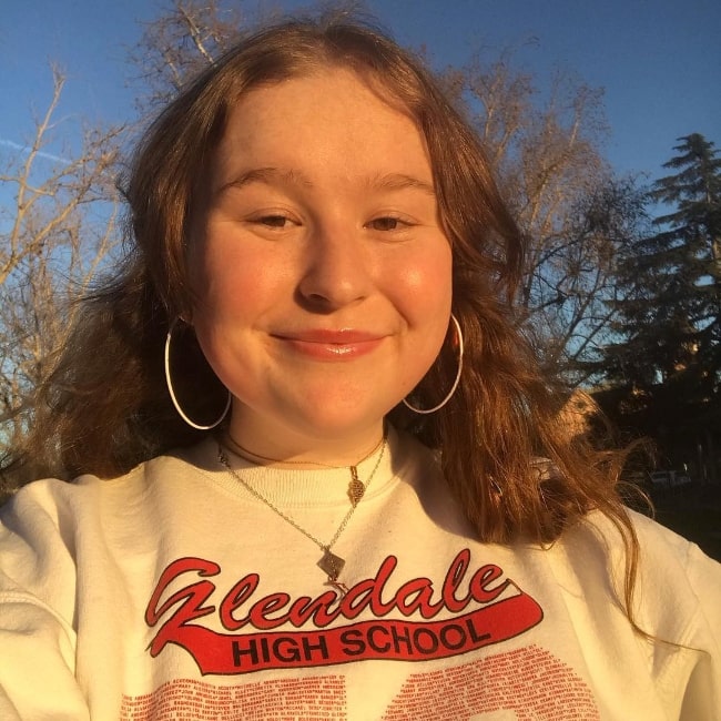 Julia Lester as seen while smiling in a selfie in Solvang, California in January 2019