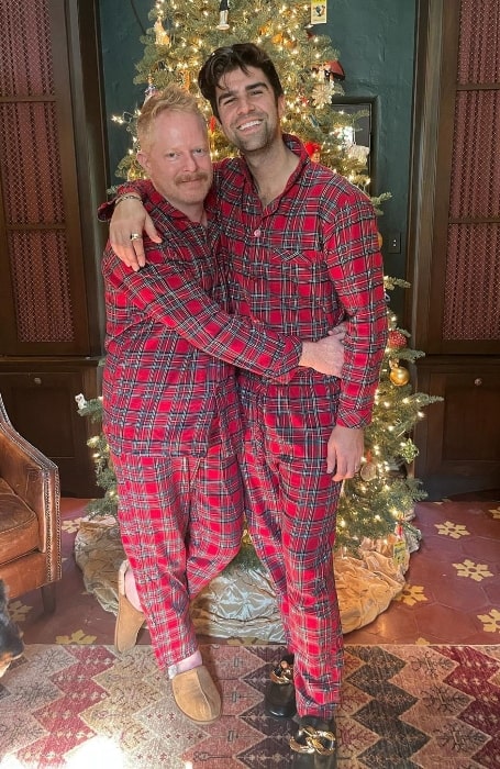 Justin Mikita (Right) and Jesse Tyler Ferguson posing for a Christmas picture in December 2020