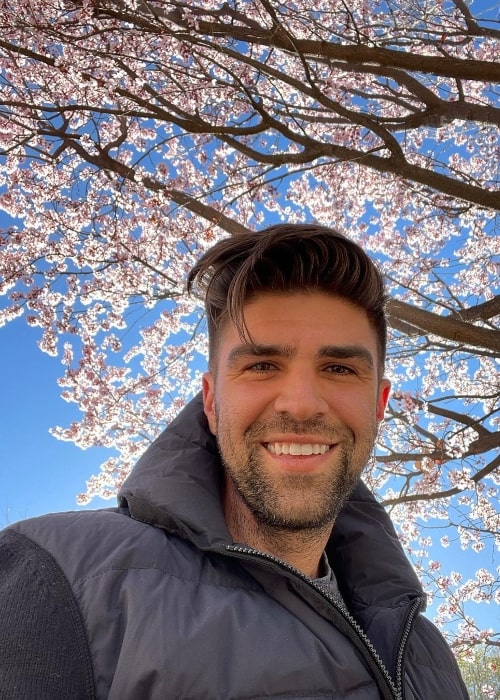 Justin Mikita smiling in a selfie at Los Poblanos Historic Inn & Organic Farm in March 2021