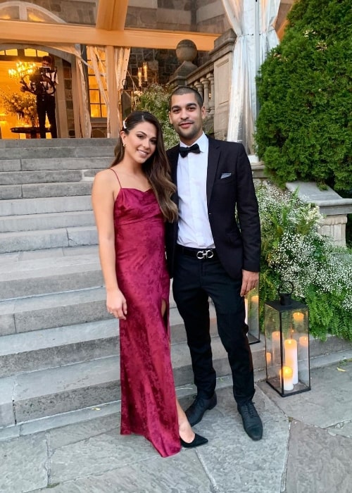 Samantha Grecchi posing for the camera alongside Nick Gray at Graydon Hall Manor in Toronto, Ontario in September 2020