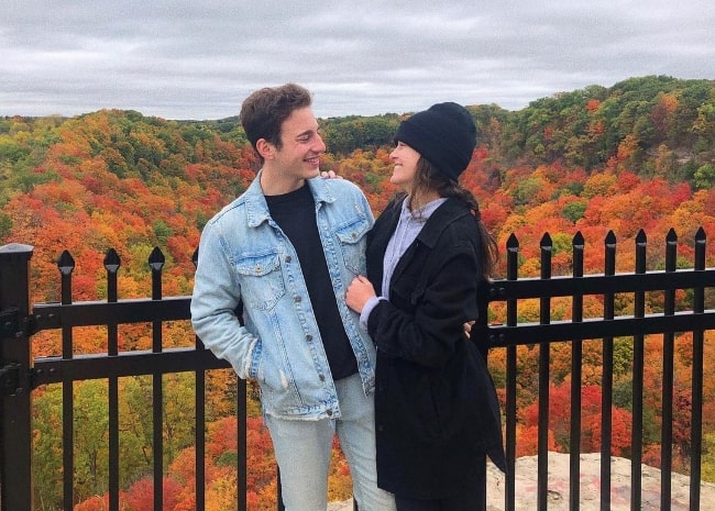 Sara Waisglass and Jeremy Kellen posing for a picture at Dundas Peak in Hamilton, Canada