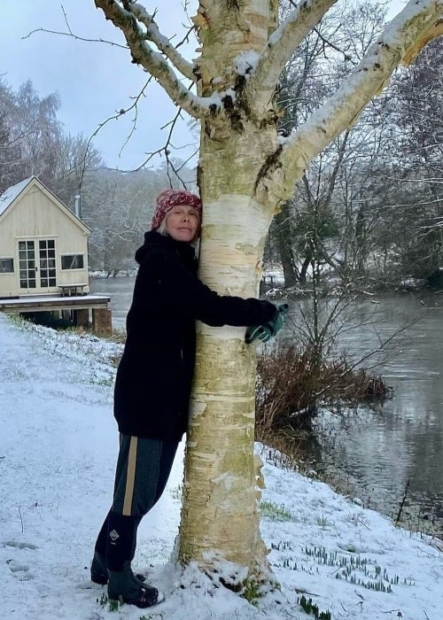 Trudie Styler pictured while hugging a tree in in January 2021