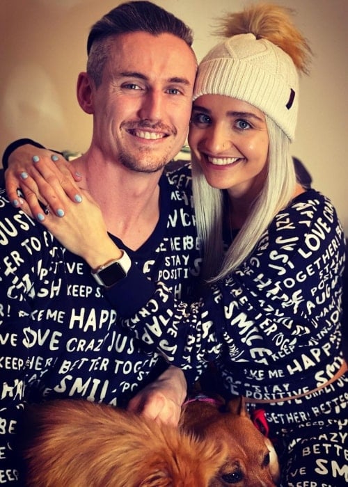 Xia Brookside as seen in a picture with her dogs and boyfriend Sean Kustom in December 2020