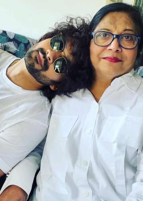 Aditya Redij posing for a picture with his mother