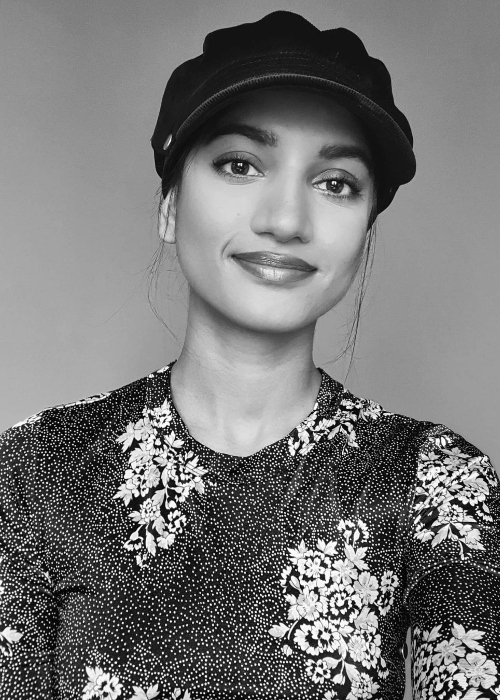 Amita Suman smiling for a picture in April 2021