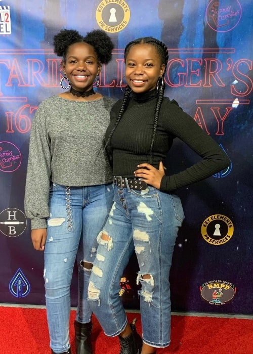 Bria Danielle Singleton (Left) and her sister Brooke smiling for the camera