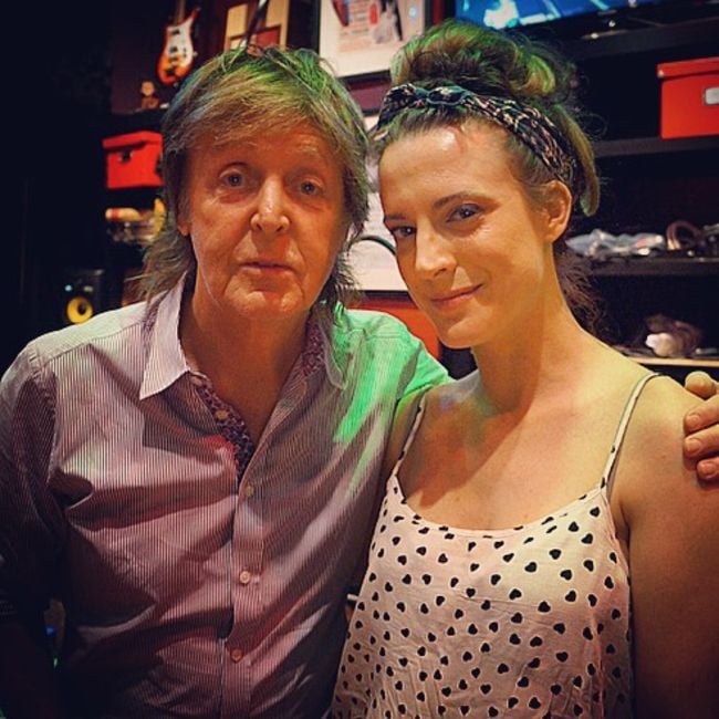 Calico Cooper posing with Paul McCartney in 2015
