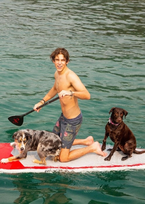 Gunnar Gehl in September 2020 with one of his dogs going overboard