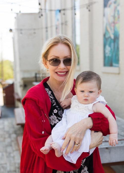 Karen Marie Moning with her grand niece, as seen in September 2017