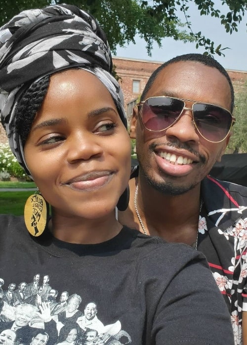 Kelly Jenrette smiling for a selfie alongside Melvin Jackson Jr.