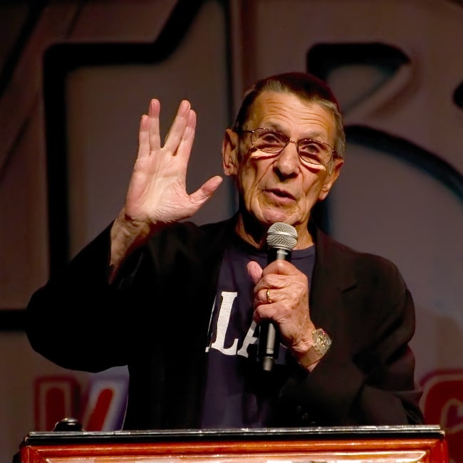 Leonard Nimoy pictured while giving the Vulcan salute at the Las Vegas Star Trek Convention 2011