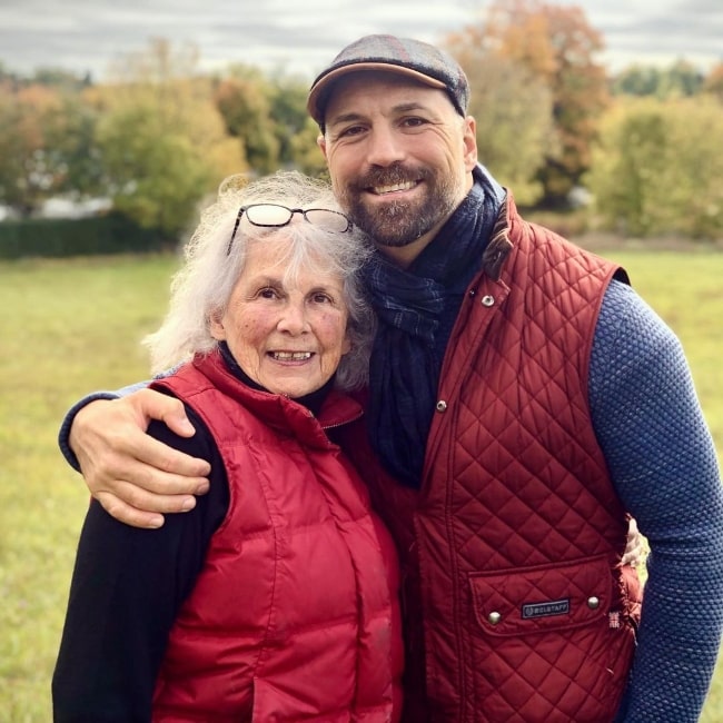 Noah Danby smiling for a picture alongside his mother in October 2020