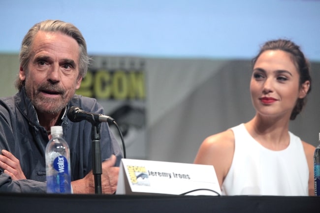 Jeremy Irons and Gal Gadot speaking at the 2015 San Diego Comic Con International, for 'Batman v Superman Dawn of Justice', at the San Diego Convention Center in San Diego, California