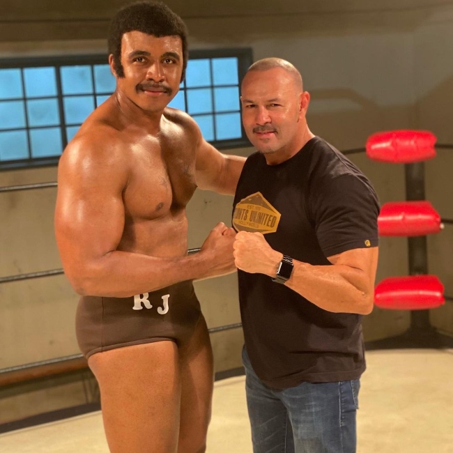 Joseph Lee Anderson (Left) posing for a picture alongside Chavo Guerrero Jr.